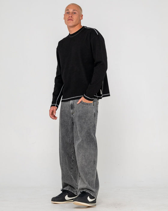 man-wearing-slack-jack-long-sleeve-heavy-tee-in-black