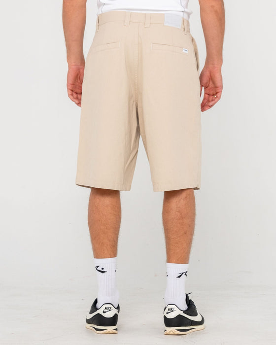 man-wearing-shindawg-pleated-short-in-abbey-stone