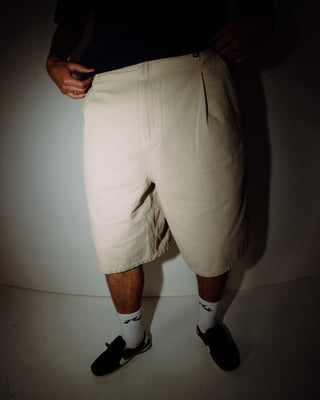 Man wearing Shindawg Pleated Short in Abbey Stone