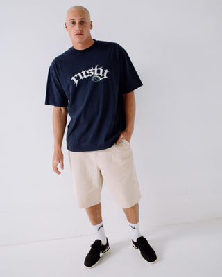 Man wearing Shindawg Pleated Short in Abbey Stone