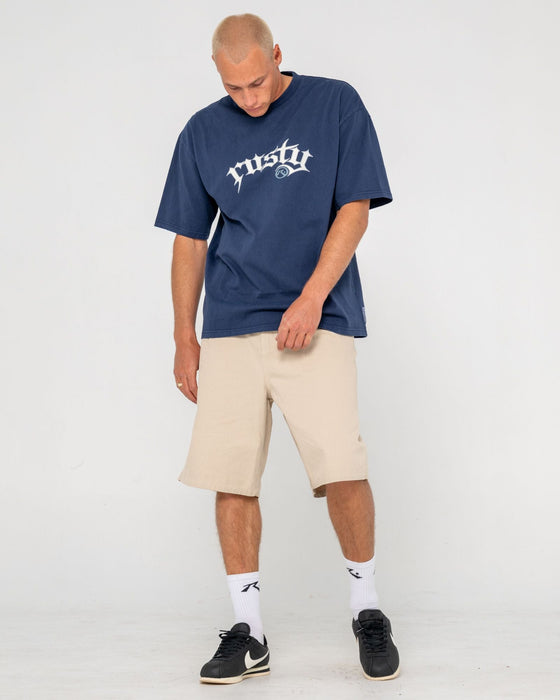 man-wearing-shindawg-pleated-short-in-abbey-stone