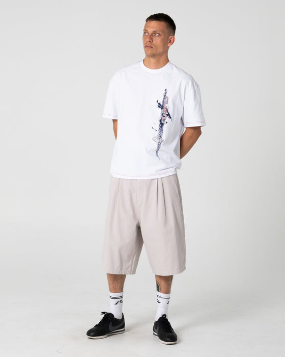 man-wearing-enigma-pleated-short-in-stone