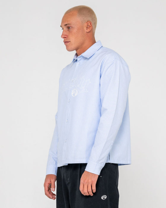 man-wearing-freaker-long-sleeve-shirt-in-sky-blue