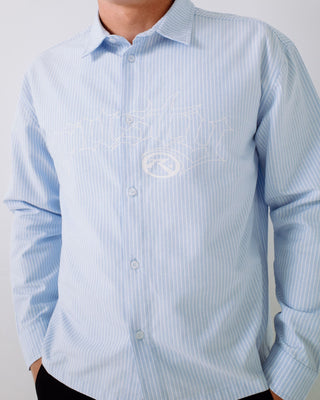 Man wearing Freaker Long Sleeve Shirt in Sky Blue
