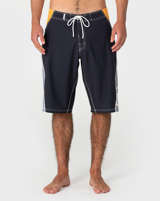 man-wearing-sandglass-fixed-waist-boardshort-in-coal
