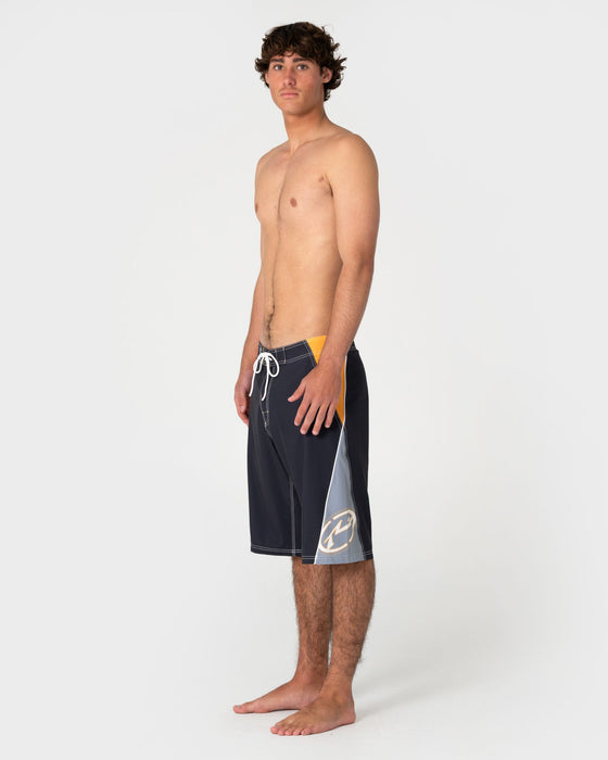 man-wearing-sandglass-fixed-waist-boardshort-in-coal