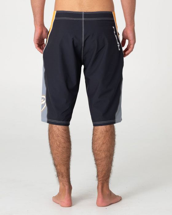man-wearing-sandglass-fixed-waist-boardshort-in-coal