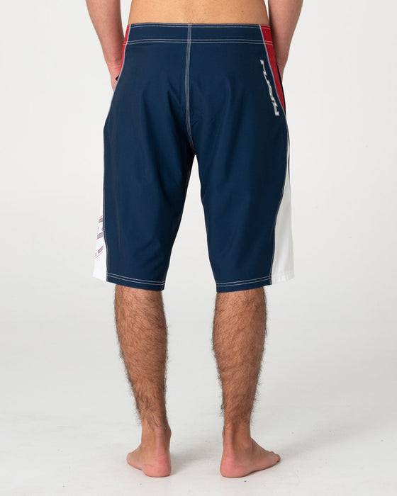 man-wearing-sandglass-fixed-waist-boardshort-in-navy-blue