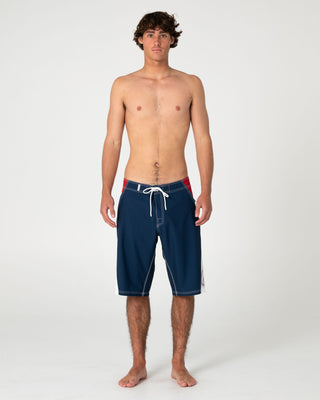 Man wearing Sandglass Fixed Waist Boardshort in Navy Blue