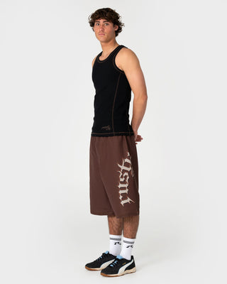 Man wearing Oosla Hybrid Waist Boardshort in Pinecone