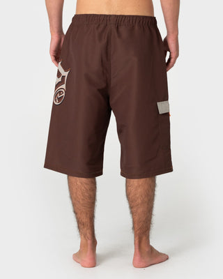 Man wearing Oosla Hybrid Waist Boardshort in Pinecone