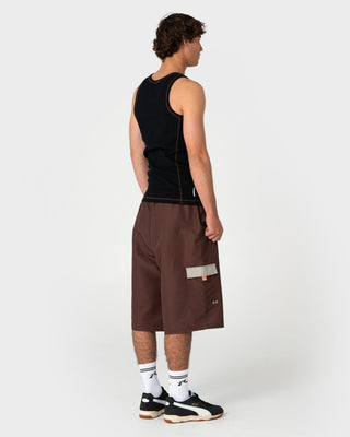 Man wearing Oosla Hybrid Waist Boardshort in Pinecone