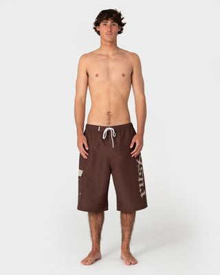 Man wearing Oosla Hybrid Waist Boardshort in Pinecone