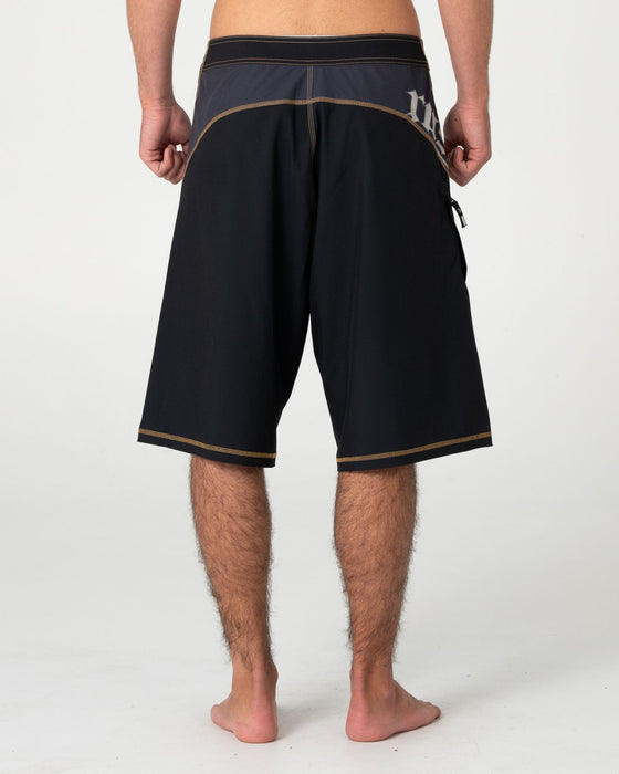 man-wearing-tribalay-fixed-waist-boardshort-in-black