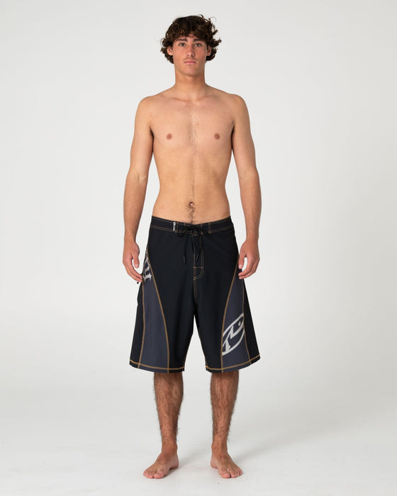 man-wearing-tribalay-fixed-waist-boardshort-in-black