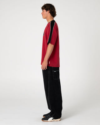 Man wearing Point Zero Engineered Jean in Black Out