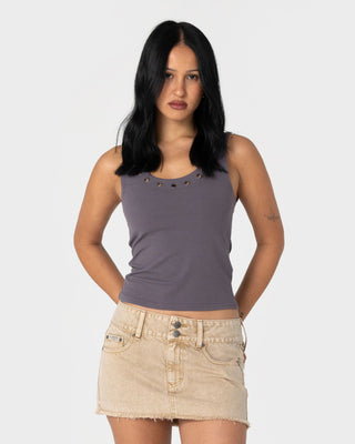 Woman wearing Eye Let Loose Tank Top in Carbon