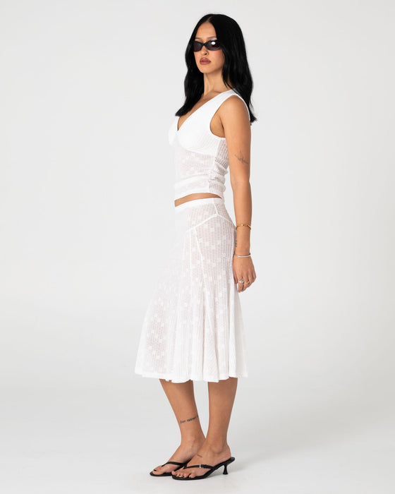 woman-wearing-roma-low-v-lace-top-in-white