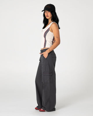 Woman wearing Rusty Cargo Low Rise Wide Pant in Washed Black