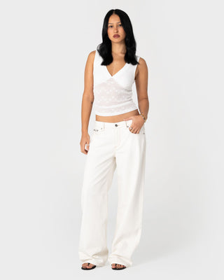 Woman wearing Snowy Lucy Loose Low Rise Jean in Snowy White