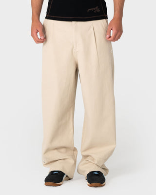 Man wearing Shindawg Pleated Baggy Pant in Abbey Stone