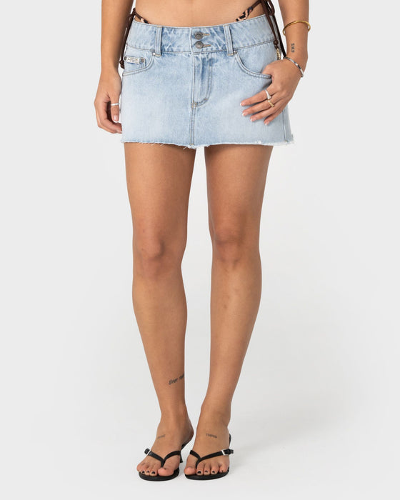 woman-wearing-chaos-low-rise-micro-mini-skirt-in-tinted-bleach-wash