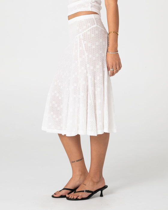 woman-wearing-roma-low-rise-lace-midi-skirt-in-white