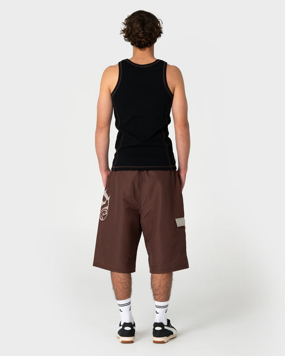 man-wearing-slack-jack-ribbed-heavy-tank-in-black2