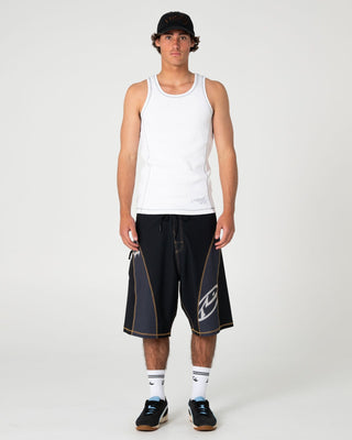 man-wearing-slack-jack-ribbed-heavy-tank-in-white