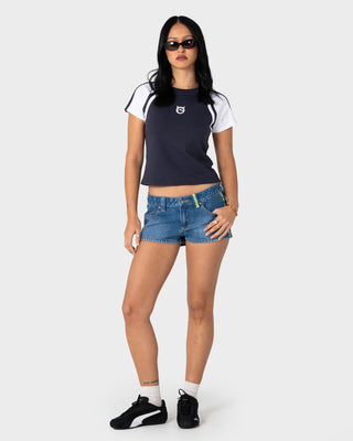 Woman wearing Flip Mommy Low Rise Micro Mini Short in Blasted Middy Blue / Lime