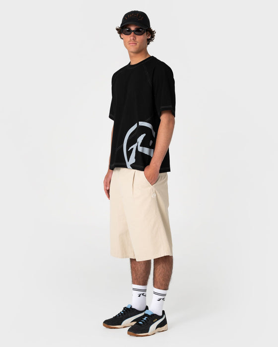 man-wearing-shindawg-pleated-short-in-abbey-stone