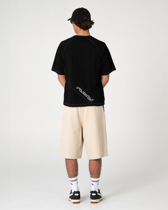 man-wearing-shindawg-pleated-short-in-abbey-stone