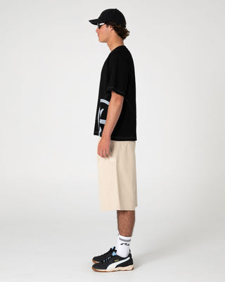 Man wearing Shindawg Pleated Short in Abbey Stone