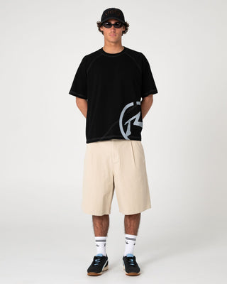 Man wearing Shindawg Pleated Short in Abbey Stone