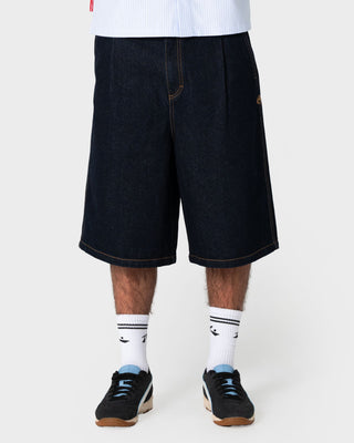 Man wearing Cashflow Pleated Jort in Raw Dawg Blue