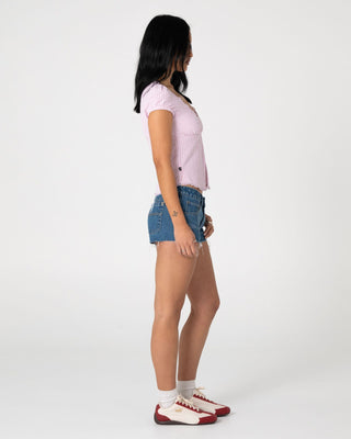 Woman wearing Hook Me Peggy Blouse in Pink Stripe