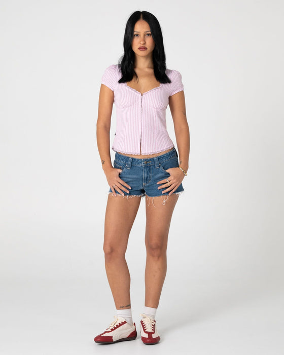 woman-wearing-hook-me-peggy-blouse-in-pink-stripe
