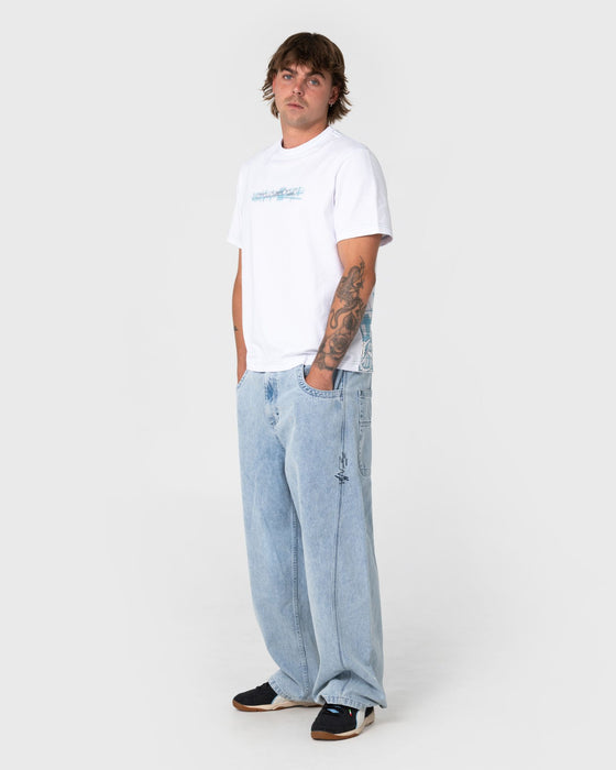 man-wearing-point-break-engineered-jean-in-true-blue