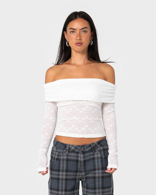 Woman wearing Veera L/S Off Shoulder Top in White