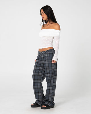 Woman wearing Veera L/S Off Shoulder Top in White
