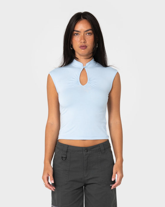 woman-wearing-monroe-keyhole-jersey-top-in-sky-blue