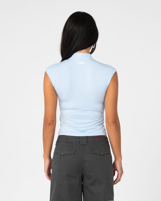 woman-wearing-monroe-keyhole-jersey-top-in-sky-blue