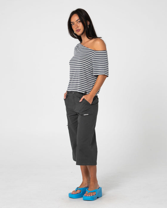 woman-wearing-sally-slouch-stripe-off-shoulder-top-in-grey-egret-stripe