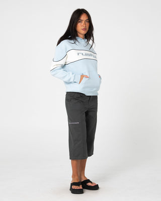 Woman wearing Kinetic Oversized Hooded Fleece in Retro Blue / Egret