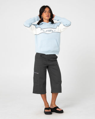 Woman wearing Kinetic Oversized Hooded Fleece in Retro Blue / Egret