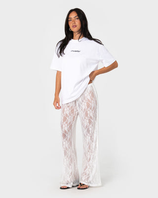 Woman wearing Lorelai Lace Straight Leg Pant in White