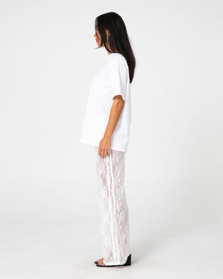 Woman wearing Lorelai Lace Straight Leg Pant in White