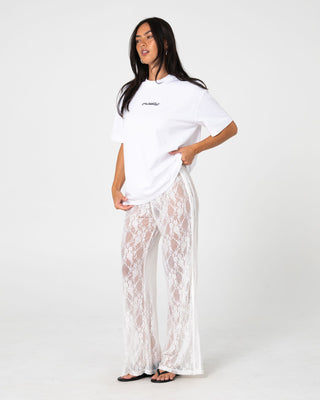 Woman wearing Lorelai Lace Straight Leg Pant in White