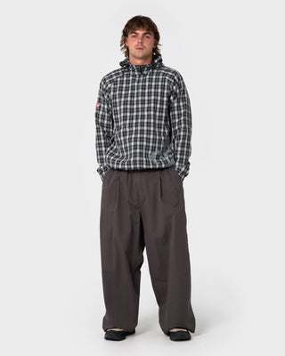 Man wearing Mista Mista Elastic Pant in Carbon