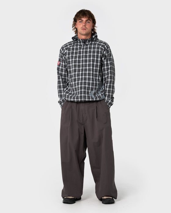 man-wearing-mista-mista-elastic-pant-in-carbon